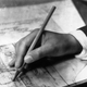 1931: A close-up of the hand of an architect at work.